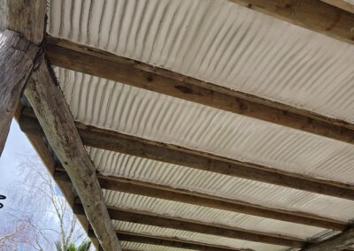 Close-up of roof deck with even spray foam insulation coverage
