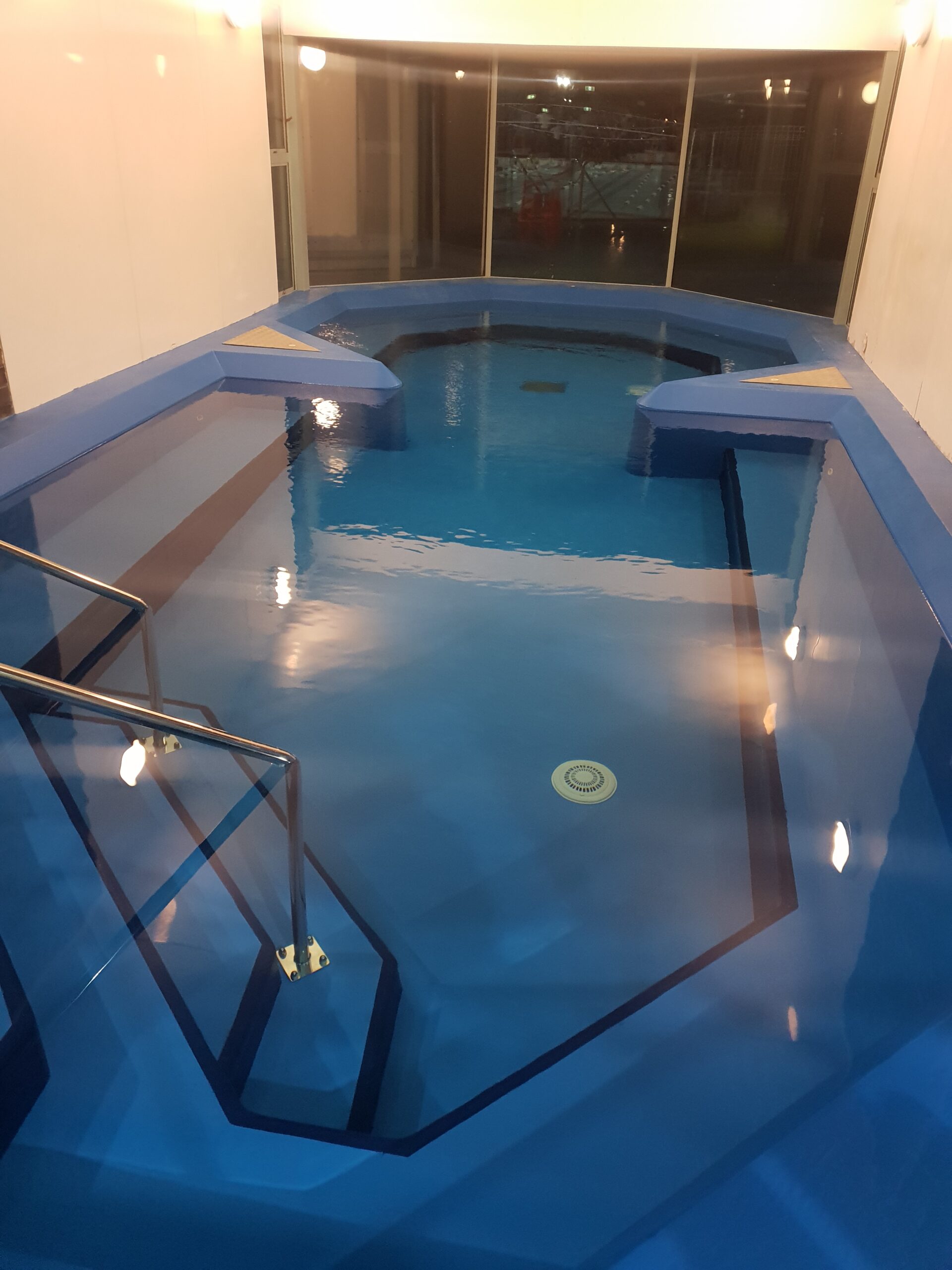 Polyurea spray coating applied to spa pool in Glen Innes for waterproofing and protection