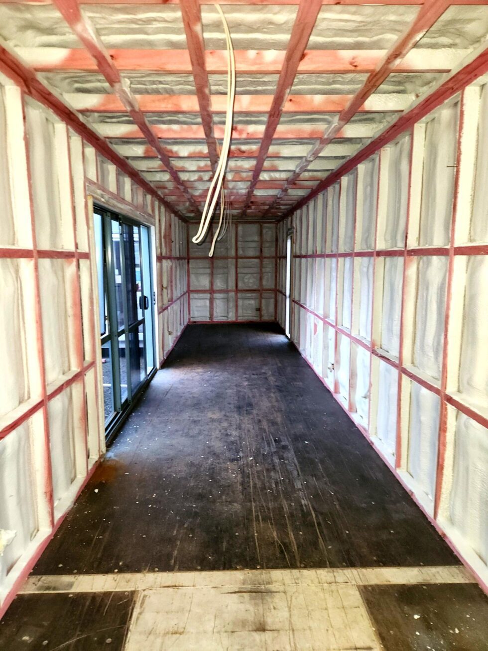 Wide view of a container learning space insulated on its walls and ceiling