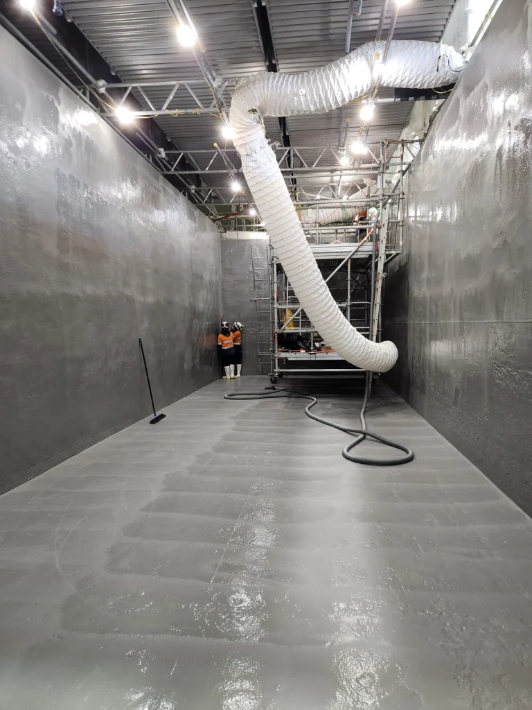 Finished protective lining inside a commercial potable water tank