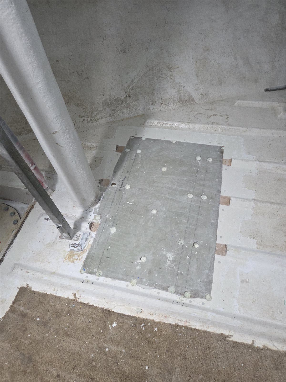 Detailed view of injection openings in a commercial vessel fish hold floor